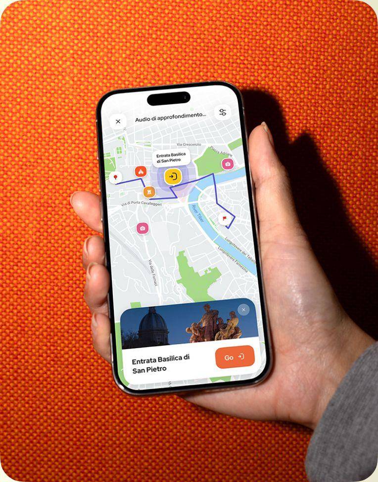 Hand holding a smartphone with the POPGuide route map
